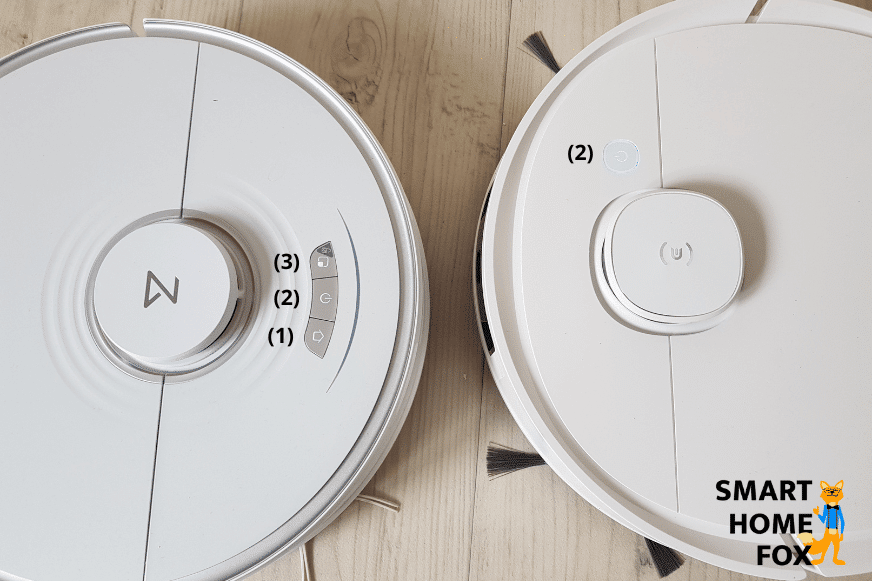 Steuerungsknöpfe auf der Oberseite des Ecovacs Deebot T9 und des Roborock S7 werden in der Nahaufnahme gezeigt